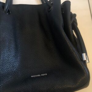 Mint condition Michael Kors Black Pebbled Leather Drawstring Shoulder Tote